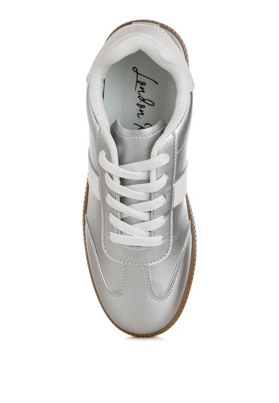 Women's metallic lace-up sneakers in silver, perfect for casual outings