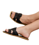 Maker's Shoes black metallic slip on sandals for women with crisscross straps and flat sole