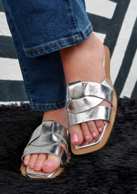 Maker's Shoes metallic slip on sandals for women with silver crisscross straps and tan sole