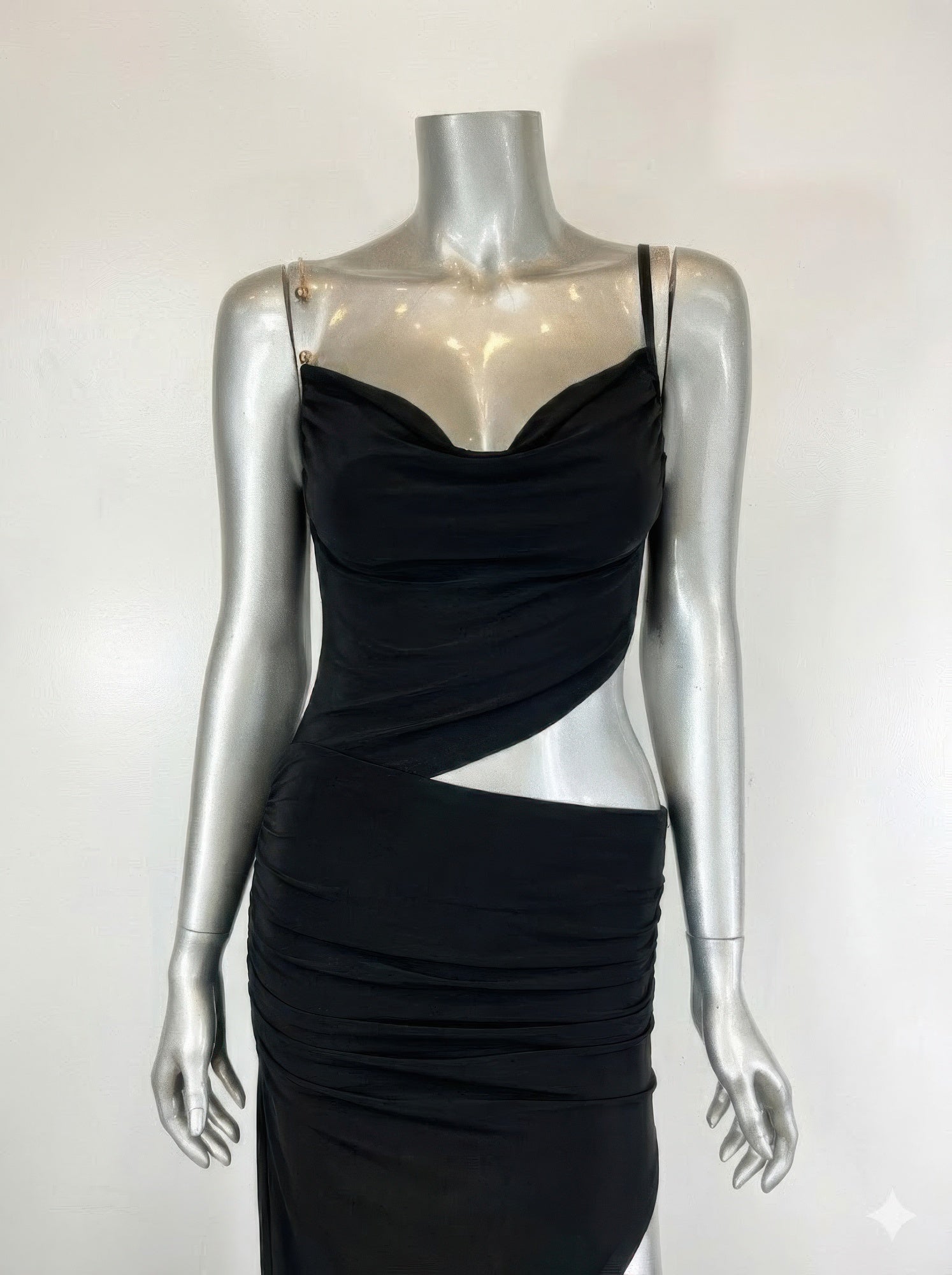 Black midi dress with ruched design, perfect for evening events