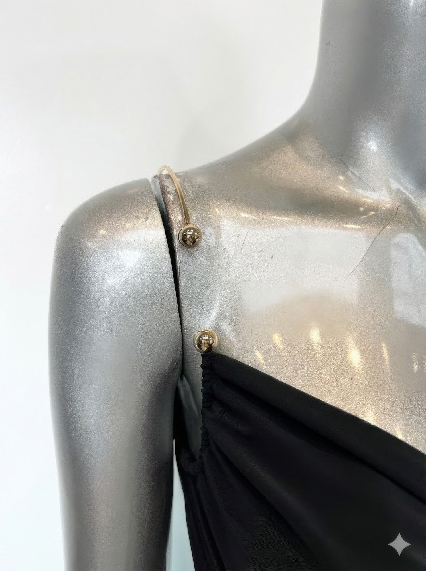 Black midi dress with gold shoulder accents for summer outings