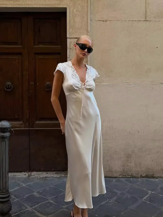 Women's silk midi dress in white, perfect for summer outings