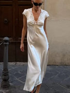 Women's silk midi dress in nude, perfect for elegant occasions