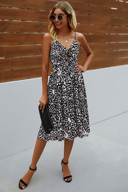 Women's black and white printed midi dress, perfect for summer outings