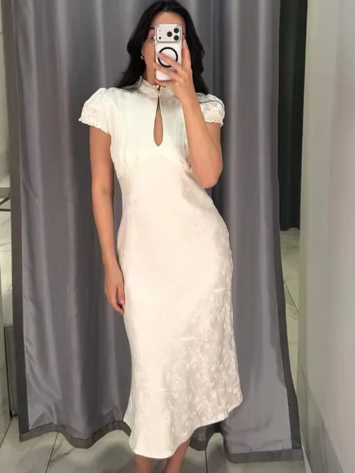 Elegant ivory midi dress, lightweight fabric, perfect for special occasions