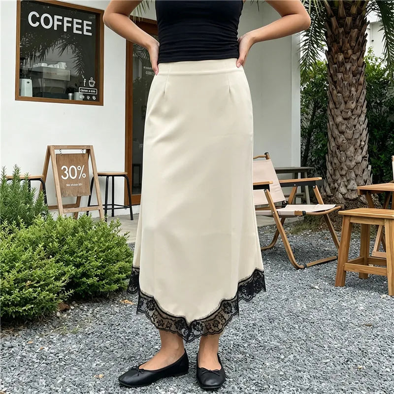 Women's midi satin skirt in cream with black lace hem for casual outings