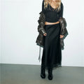 Black satin midi skirt, stylish for casual outings