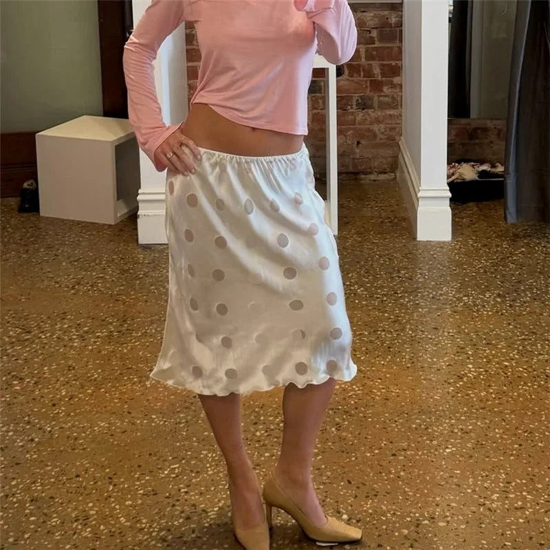 Women's white midi skirt, polka dot design, perfect for casual outings