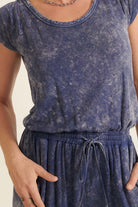 Mineral washed knit jumpsuit in blue with a comfortable fit and adjustable waistband for casual wear
