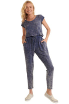 Women's mineral washed knit jumpsuit in blue with short sleeves and drawstring waist for casual comfort