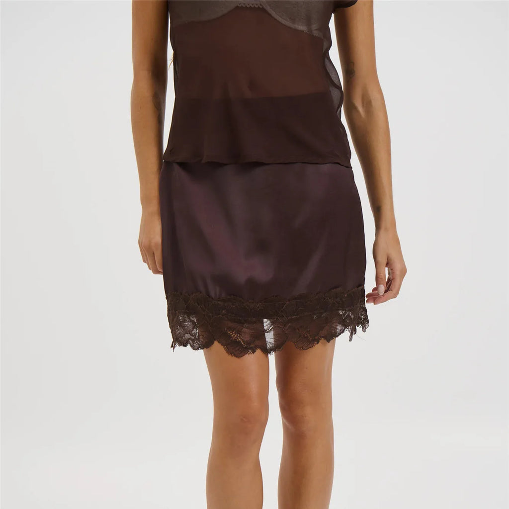 Women's black lace mini skirt, perfect for summer outings