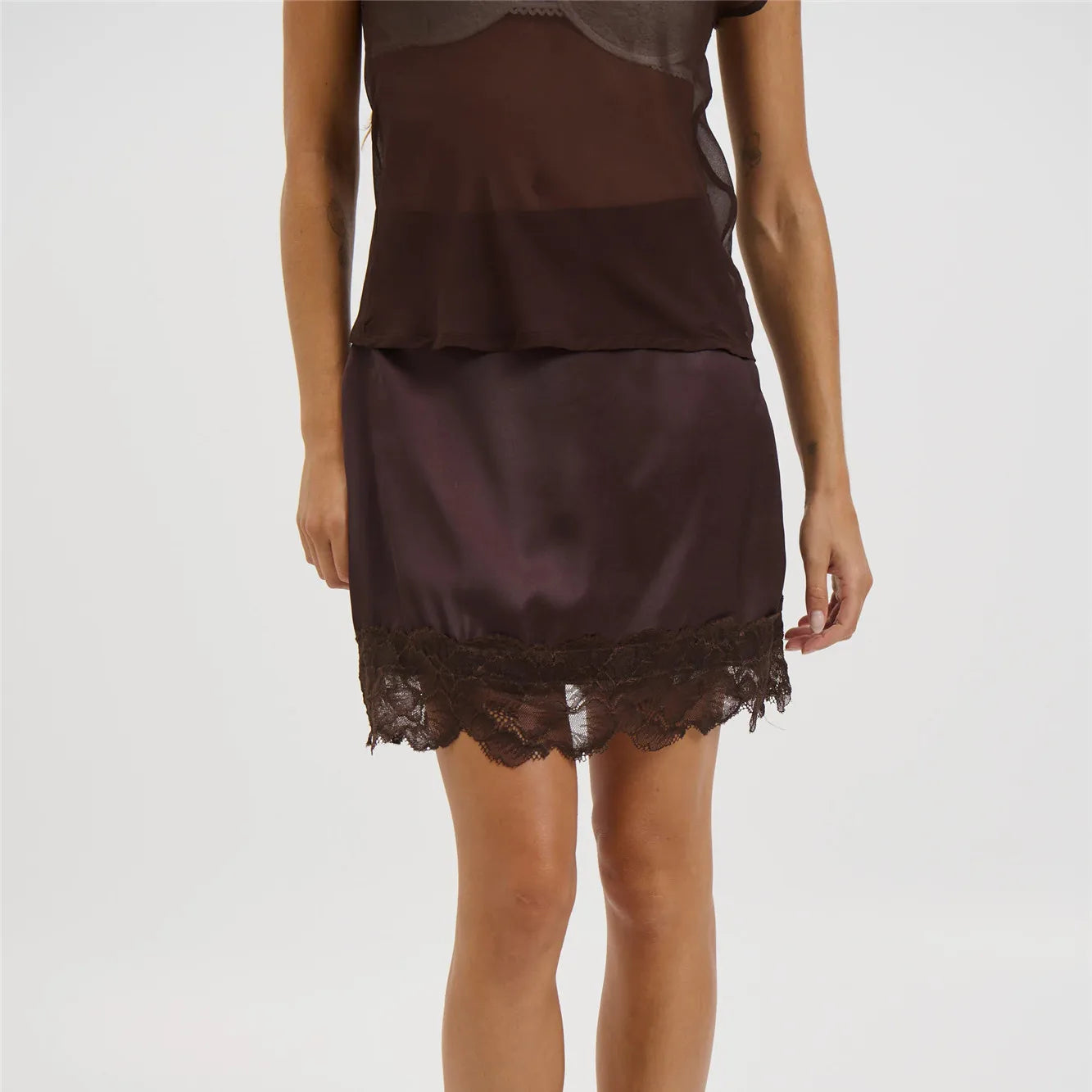 Women's black lace mini skirt, perfect for summer outings