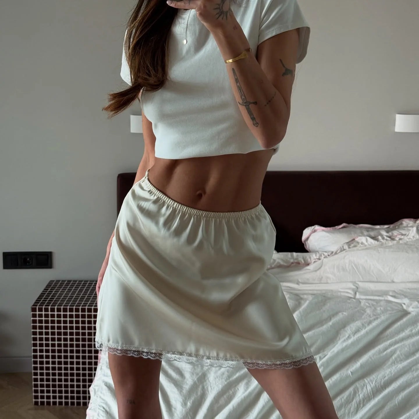 Women's cream mini skirt, soft fabric, perfect for casual outings
