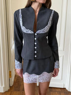 Women's gray mini skirt with lace trim, perfect for stylish outings