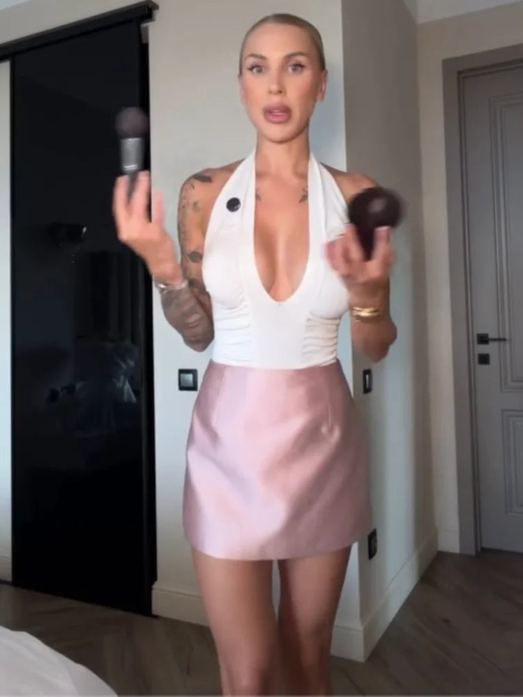 Women's silky pink mini skirt for stylish casual outings