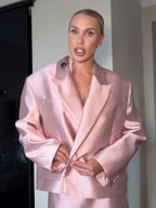 Women's pink satin mini skirt for fashionable outings