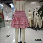 Women's red gingham mini skirt, tiered design for summer outings