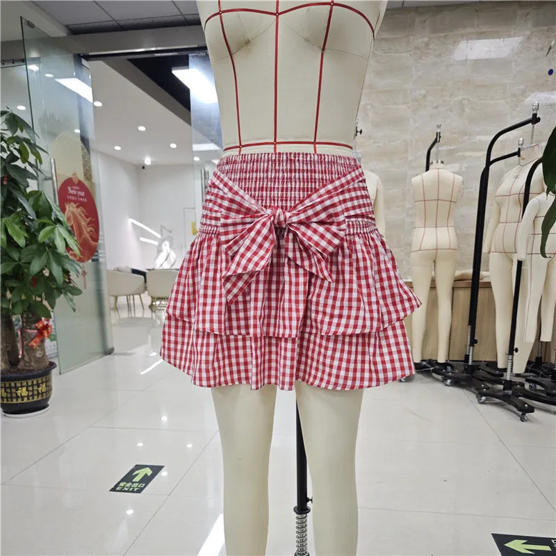 Women's red gingham mini skirt, casual summer style with ruffle and bow