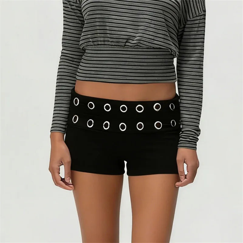 Women's black mini skirt shorts with eyelet accents for casual wear