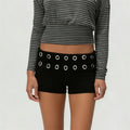 Women's black mini skirt shorts with eyelet accents for casual wear