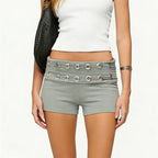 Women's mini skirt shorts in gray with decorative eyelets, perfect for summer outings
