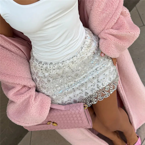 Women's silver sequined mini skirt, perfect for parties