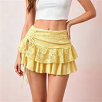 Women's yellow lace mini skirt, perfect for summer outings