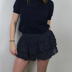 Navy blue cotton mini skirts with layered ruffle design for casual wear