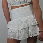 White mini skirts and ruffled design, perfect for summer outings