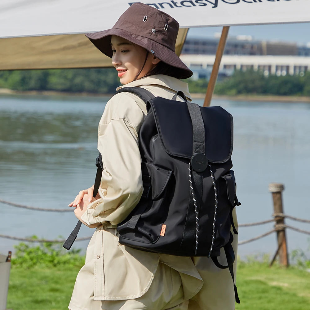 Black travel backpacking backpack, water-resistant for outdoor adventures
