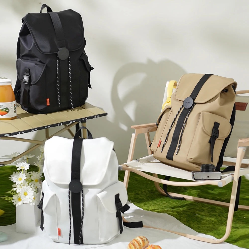 VacationGrabs travel backpacking backpack in black, white, and beige colors