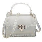 VacationGrabs monotone studded clutch bag with a transparent design and studded accents for stylish outings