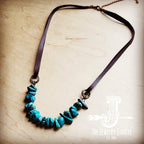 Natural turquoise leather cord necklace with hand-strung turquoise stones on a brown leather cord
