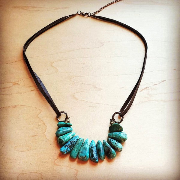 Natural turquoise leather cord necklace featuring chunky turquoise beads for a stylish look