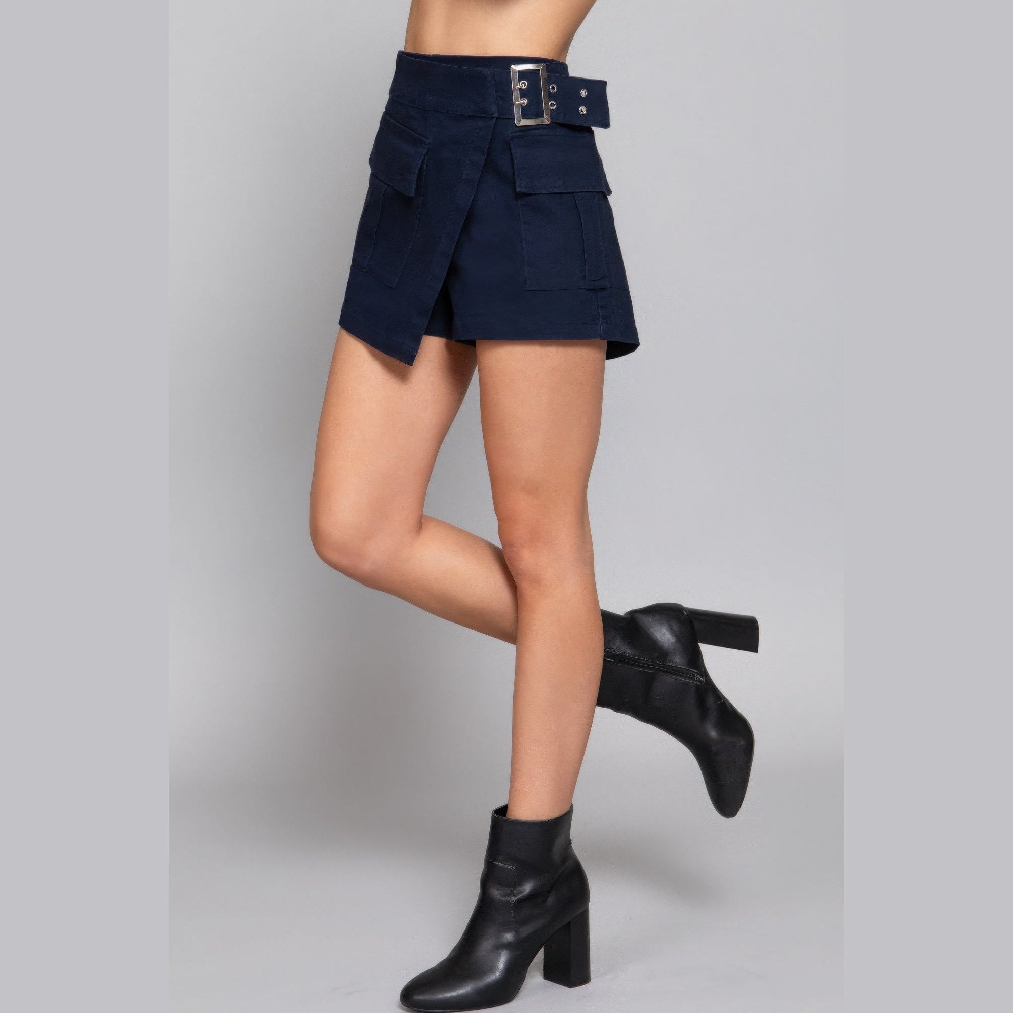 Women's navy blue cargo skort with pockets, perfect for casual outings