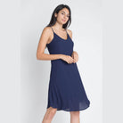 Navy blue flowy dress from Ivory Felix, featuring a simple design and adjustable straps