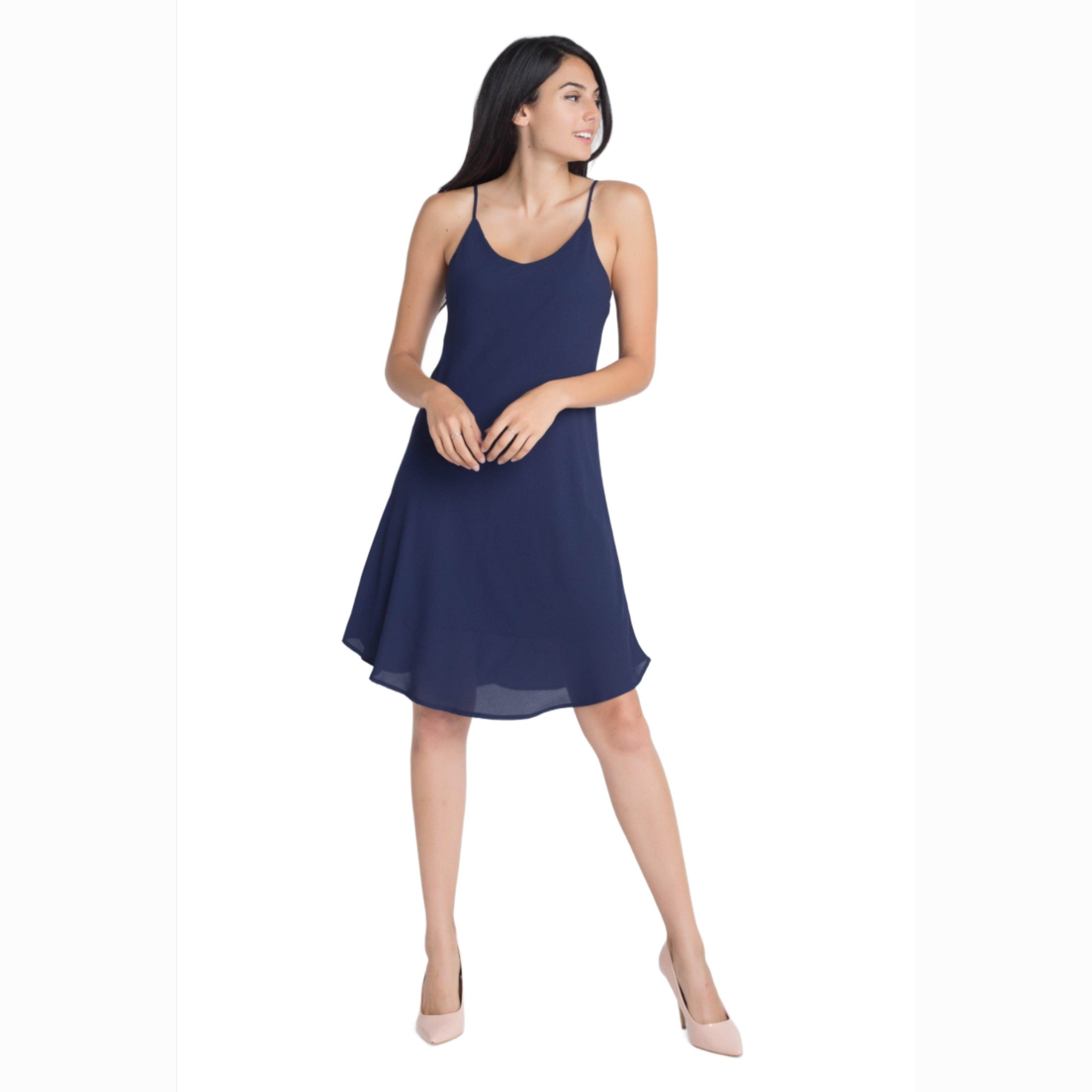 Ivory Felix navy blue flowy dress with adjustable straps and a graceful hemlin