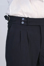Navy Double-Pleated High-Waisted Slim Fit Trousers with Side Buckles – detail view