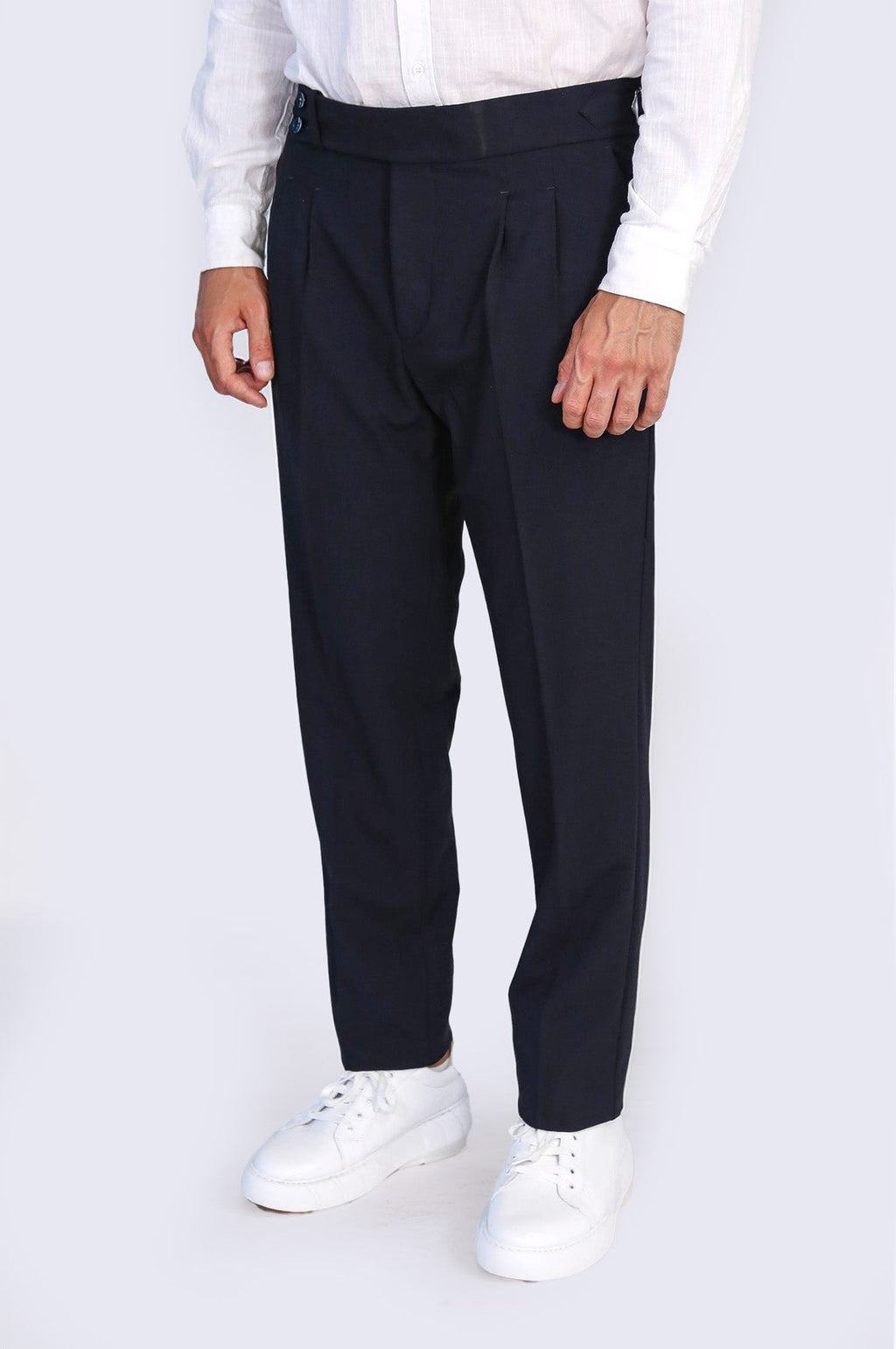 Navy Double-Pleated High-Waisted Slim Fit Trousers with Side Buckles – styled view