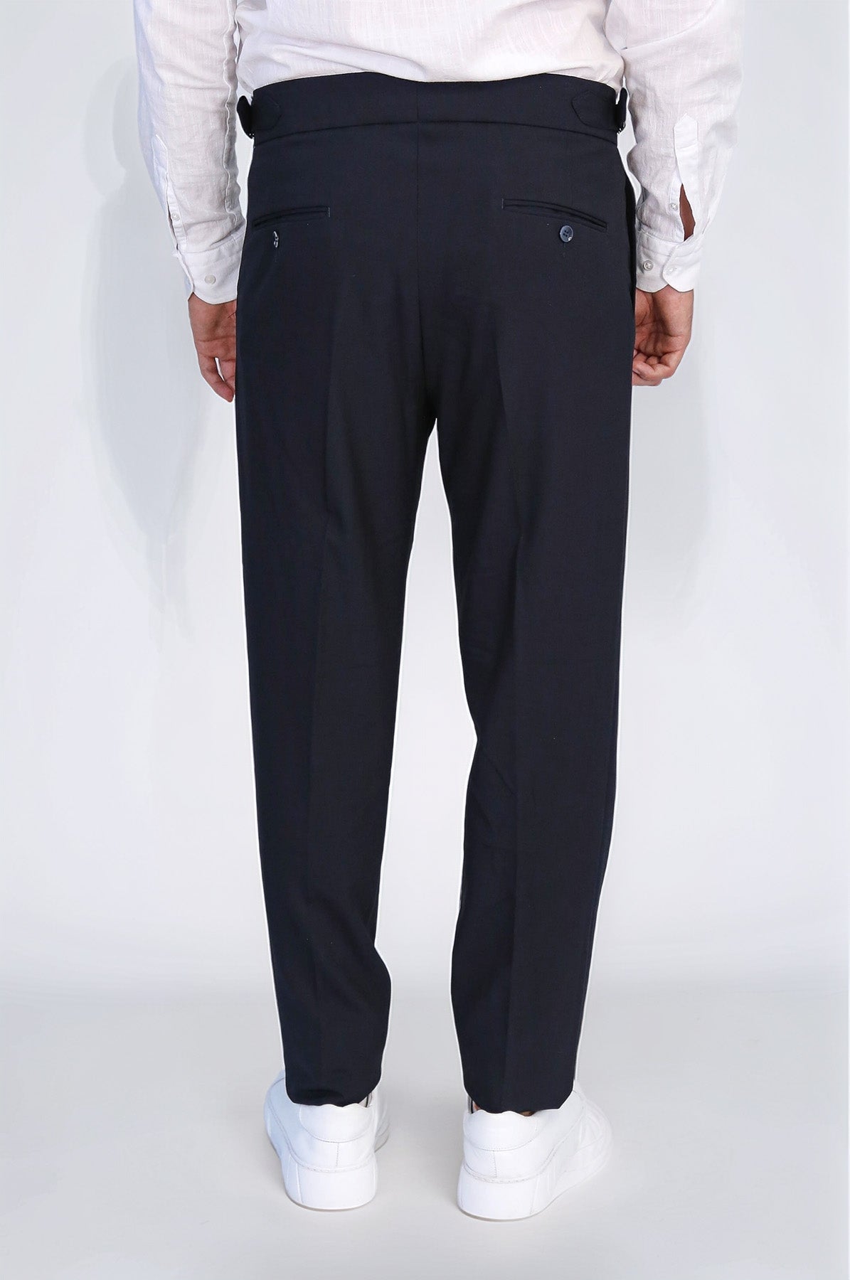 Navy Double-Pleated High-Waisted Slim Fit Trousers with Side Buckles – fabric detail view