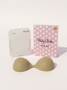New and improved womens sticky bra by Sticky Boobs with packaging and adhesive pads for secure support