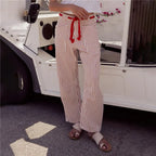 Striped new denim pants with red drawstring, perfect for casual outings