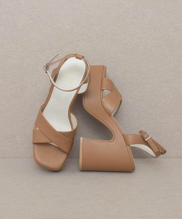 Norah chunky platform heels by Oasis Society in brown with stylish crisscross straps