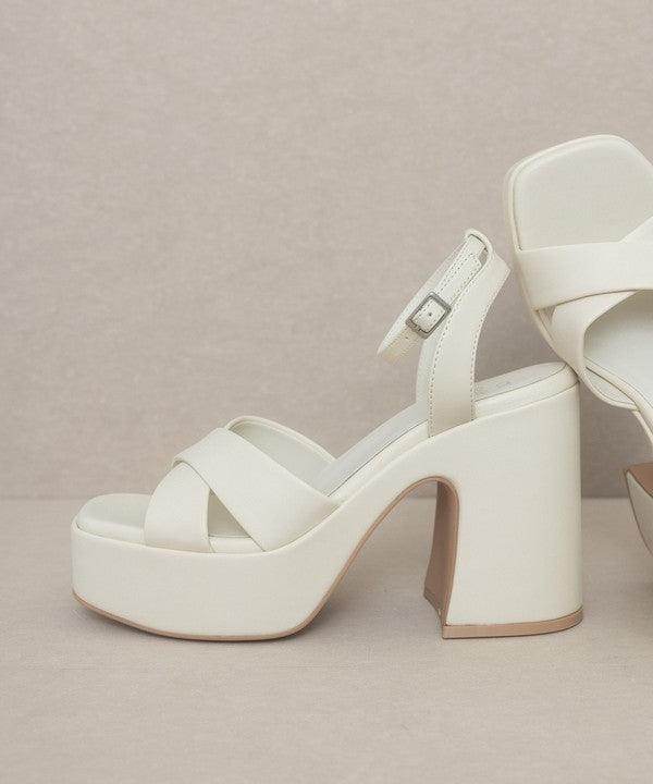 Norah chunky platform heels in white with stylish cross straps for a trendy look