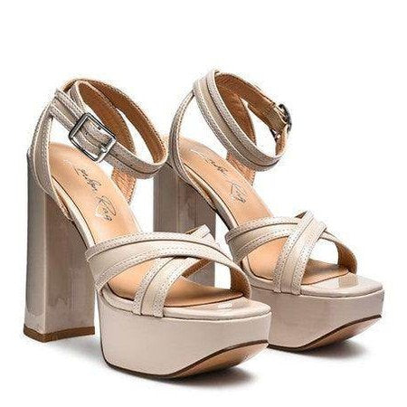 Nyle heeled sandals in beige with a block heel and sleek straps for stylish women