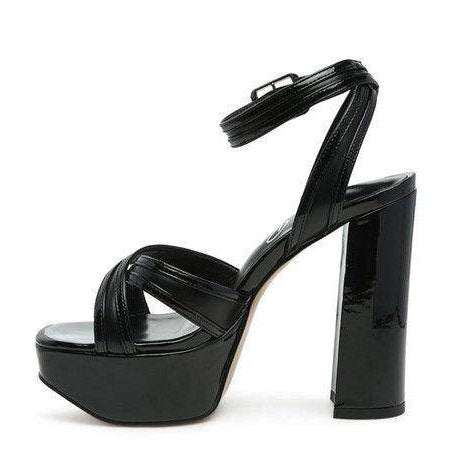 Stylish black Nyle heeled sandals with a chunky heel and ankle strap for women's fashion
