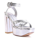 Stylish Nyle heeled sandals in silver with a high platform and ankle strap design for fashionable outings