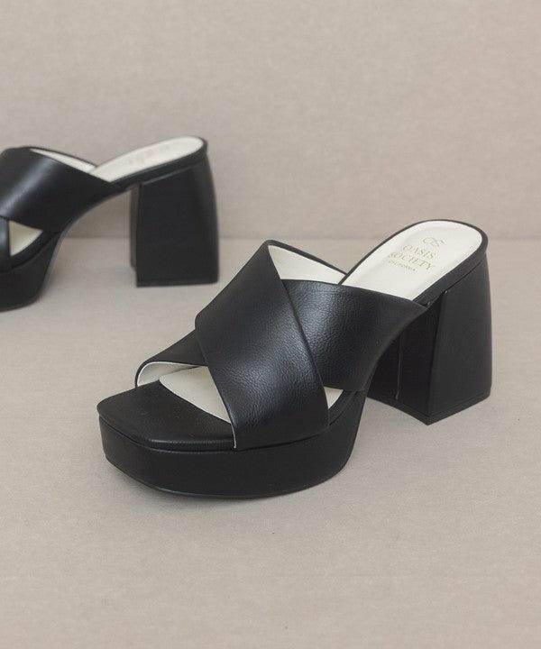 Stylish Oasis Society platform mule sandals in black with cross-strap design and block heels