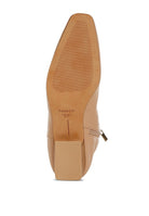 Bottom view of Obita leather boots for vacation showing detailed outsole and quality craftsmanship