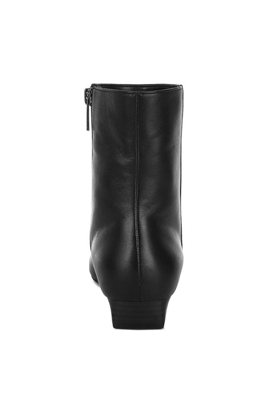 Back view of Rag Company Obita leather boots for vacation with a sleek design and zipper
